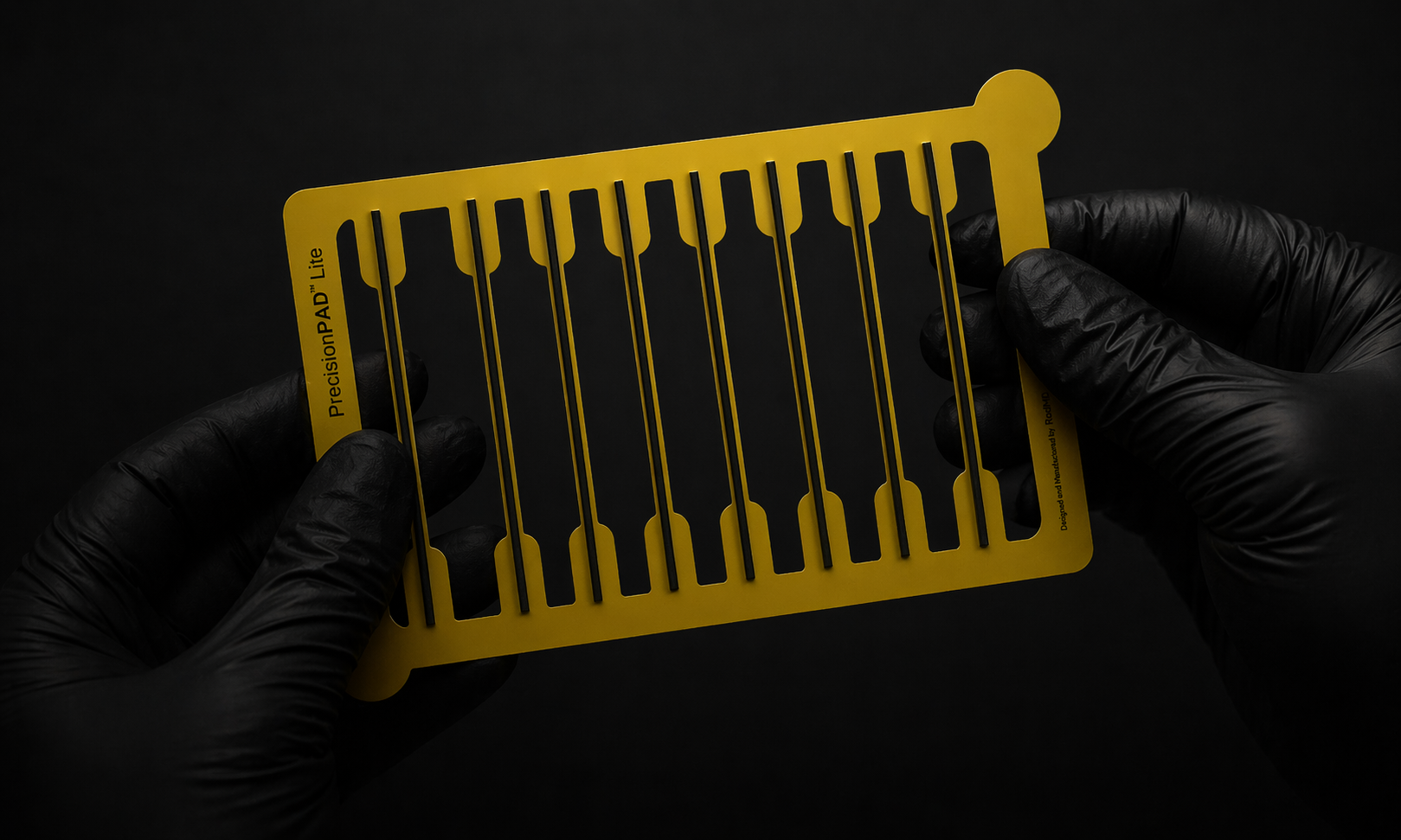 PrecisionPAD held by gloved hands